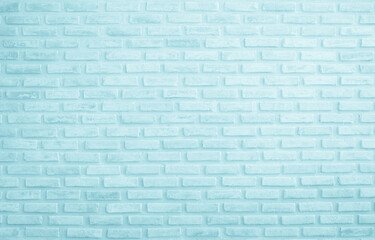 Brick wall painted with pale blue paint pastel calm tone texture background. Brickwork and stonework flooring interior rock old pattern clean concrete grid uneven bricks design stack backdrop.