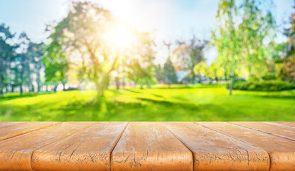 Wooden table and natural blurred background