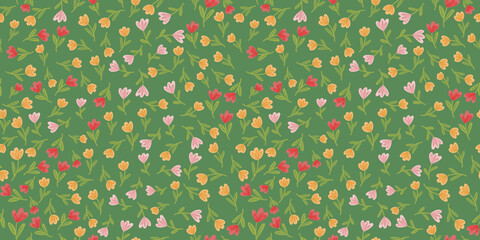 Red yellow pink flower seamless pattern on green background