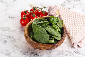 Green spinach leaves in the bowl