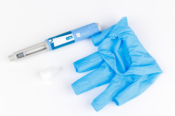 Weight control and diabetes pens placed for medical-themed imagery