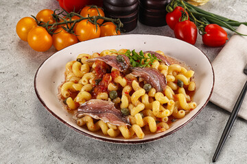 Italian pasta cellentani with anchovy