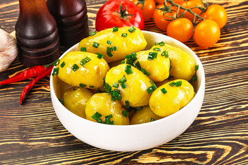 Boiled young potato with green onion