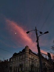Pink sky over elegant architecture