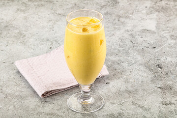 Cold sweet mango smoothie glass