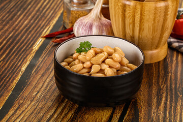 Baked white canned beans in the bowl