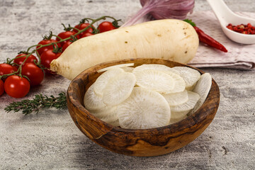 Sliced white daikon radish in the bowl