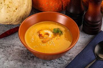 Pumpkin cream soup with prawns