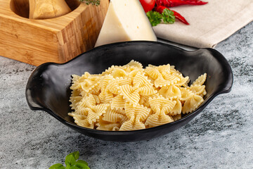Italian pasta Farfalle with oil