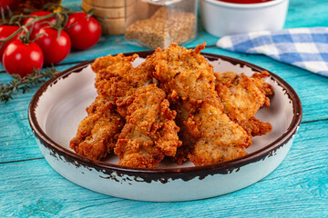 Golden crispy fried chicken strips