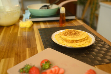 Close up of delicious pancakes on a kitchen table ready for breakfast