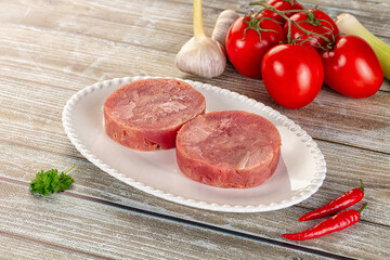 Raw round tuna fish fillet