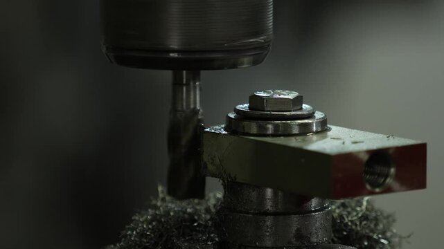 VDO 4K Lathe is working on turning metal parts for industrial use.