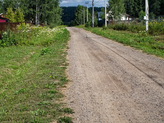 Dirt road in a holiday village in summer