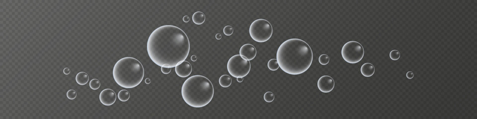 A set of colorful and colorful soap bubbles to create a design. Isolated, transparent, realistic soap bubbles on a transparent background.