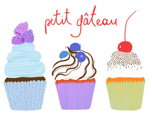 Colorful isolated cupcakes with berries on top