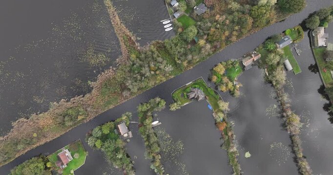 Vinkeveense plassen, recreational lake, nature, water sports area, boats, leisure houses, sailing, aerial drone video. Nature in The Netherlands,