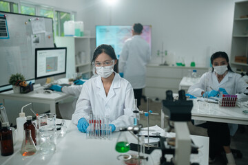 Fototapeta premium Medical science and technology professionals working in a laboratory research environment where scientists conduct chemistry tests and medical experiments to improve global healthcare