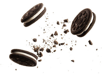 flying Oreo cookies with crumbs isolated on transparent white background, clipping path isolated on white background PNG