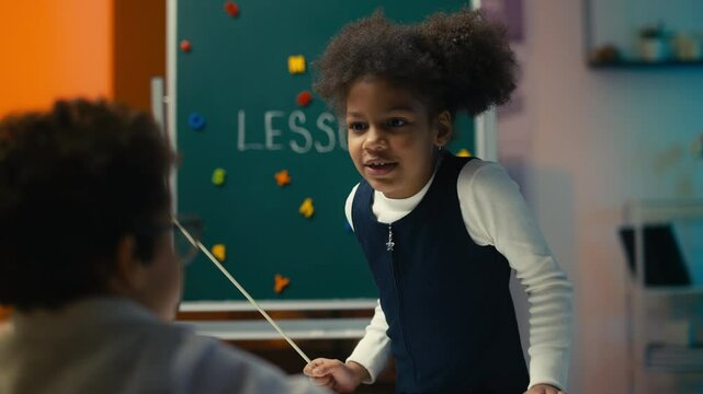 African American girl with pointer roleplays strict teacher, scolding classmate