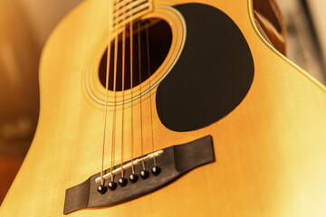 close-up of an expensive-looking acoustic guitar	
