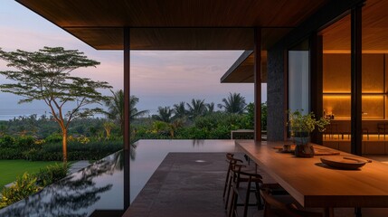 An open luxurious dining area overlooking a scenic landscape and water