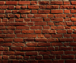 Weathered red brick wall texture with rough surface pattern