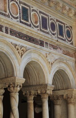 St. John Lateran Basilica Cloister Detail with Arches and Cosmatesque Mosaic Decoration in Rome, Italyl