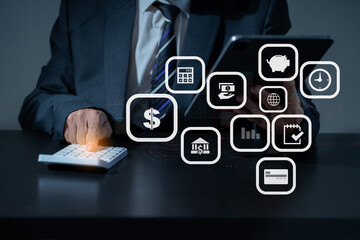 Businessman sit at workplace desk in home office use calculator calculates monthly expenses, taxes.