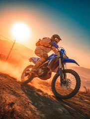 Off-Road Dirt Bike Rider Racing at Sunset on Dusty Mountain Trail