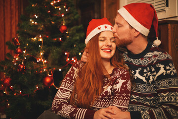 Young family enjoying christmas at home