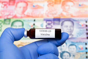 Covid-19 vaccine on a Philippine money