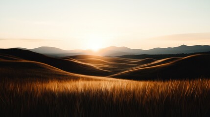 Obraz premium A golden sunset illuminates a scenic landscape with rolling hills