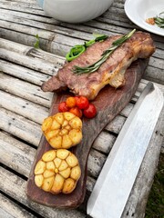 Close up Steak on wood plate.