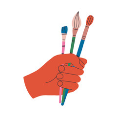 Hand holds a drawing brushes
