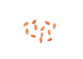Linseeds isolated on a white background, view from above. Brown flax seeds.