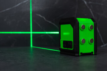 Construction laser level in a building under construction. Laser equipment at a construction site