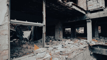 destroyed and burned houses in the city in Ukraine