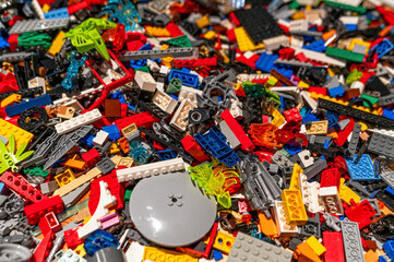 Colorful assortment of building blocks scattered on a table at a creative workshop event