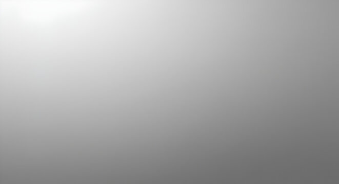 A smooth, muted gray gradient background, subtly transitioning from light to dark gray