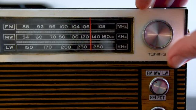 Exploring a radio station on an antique radio from the 1970s. A detailed view with audio.