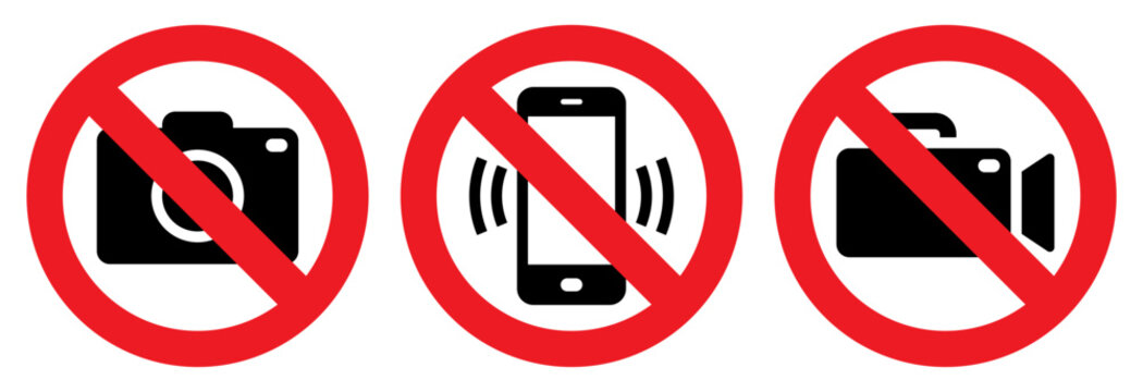 Warning signs - no phone, no camera, no camcorder. Mobile phone, taking photos and video prohibited.