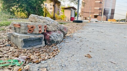 Pile of Rocks and Stones on Urban Street Corner