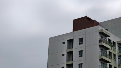 Modern Residential Building Against Cloudy Sky