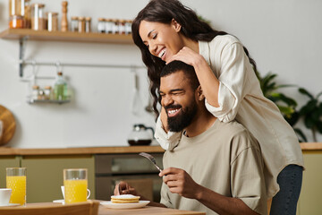 Celebrating love in a cozy home with smiles and sweet moments between two partners