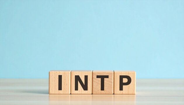 Wooden cubes with abbreviation INTP on table. Introverted, Ntuitive, Thinking, Perceiving.