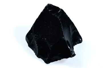 Shiny Black Natural Obsidian Stone Fragment with Sharp Edges on White Background