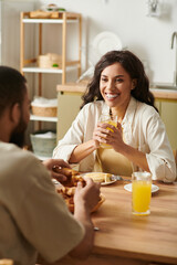 Cherishing moments over breakfast in a cozy home setting with a loving couple