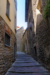 Old buildings along via Arena at Bergamo, Italy