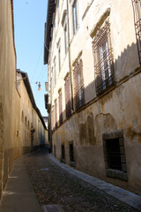 Fototapeta premium Old buildings along via Arena at Bergamo, Italy